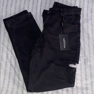 Washed black denim with splits on thigh